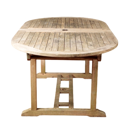 189 - A CONTEMPORARY TEAK GARDEN TABLE with extending mechanism however lacking leaves, 75cm high x 180cm ... 