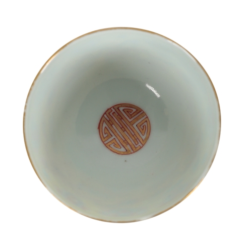 202 - A SMALL CHINESE  FAMILLE ROSE YELLOW GROUND DISH 20th century; together with a similar teabowl and s... 