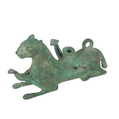 223 - A BRONZE INCENSE BURNER in the form of a recumbent leopard, the surface of the metal with extensive ... 