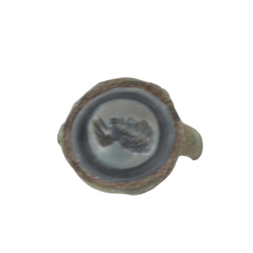 228 - A COLLECTION OF FIVE ROMAN STYLE BRONZE RINGS with stone intaglio decoration (5)