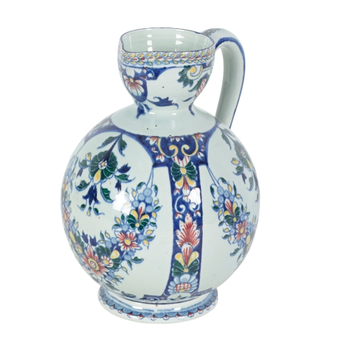 240 - TWO GIEN FIAENCE JUGS 2nd half 19th century, both 22cm high, one example decorated with birds amongs... 