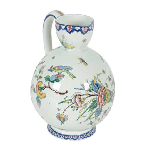 240 - TWO GIEN FIAENCE JUGS 2nd half 19th century, both 22cm high, one example decorated with birds amongs... 