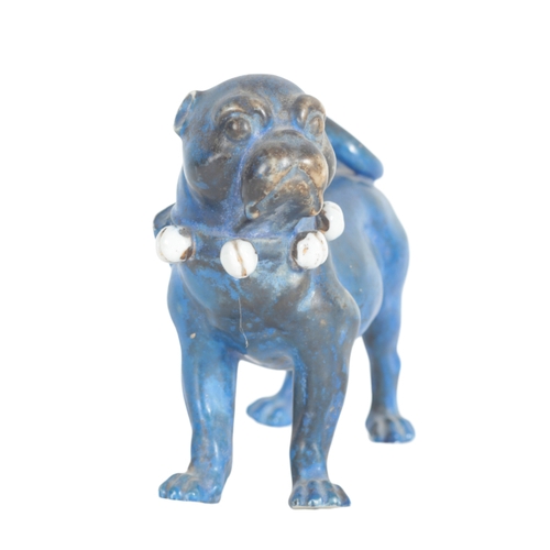 252 - A PAIR OF CONTINENTAL PORCELAIN PUGS 20th century, blue-painted with beaded collars, 13cm high (2)