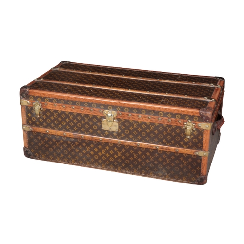 268 - A LOUIS VUITTON STAMPED LEATHER BRASS-BOUND WOODEN TRUNK with brass locks and handles, the lock to t... 