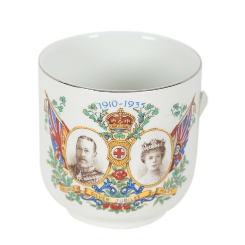 357 - A GEORGE V SILVER JUBILEE PRINTED HANDKERCHIEF 27cm square; a George V Silver Jubilee mug (damaged) ... 