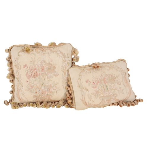 360 - A PAIR OF FLORAL TAPESTRY CUSHIONS 20th Century in the Victorian style, with tasselled edges, 38cm s... 