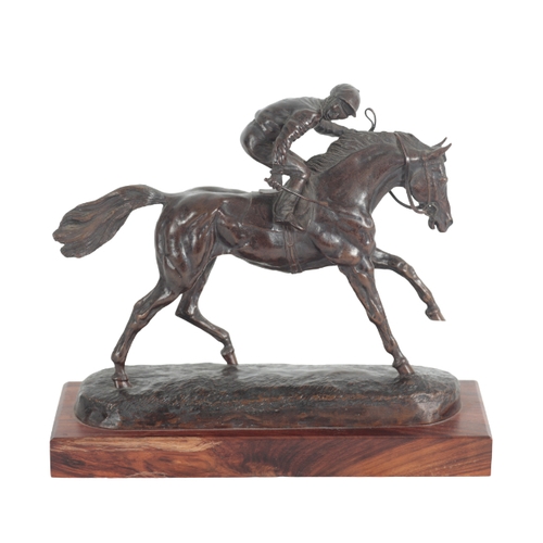 374 - DAVID GEENTY (B. 1945), A RACEHORSE WITH JOCKEY UP dark brown patinated bronze, signed, on wooden pl... 