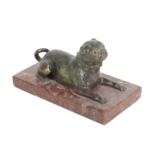 378 - A PATINATED BRONZE MODEL OF A PUG with glass eyes, on  marble base, 10cm high, the base 19cm x 9.5cm