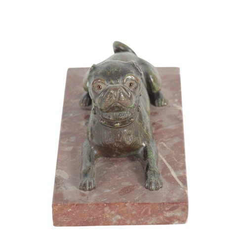 378 - A PATINATED BRONZE MODEL OF A PUG with glass eyes, on  marble base, 10cm high, the base 19cm x 9.5cm