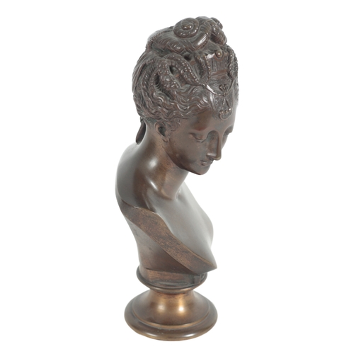 392 - AFTER JEAN GOUJON (c.1510-c.1567) A BRONZE BUST OF DIANA 20th century, on a turned plinth, 28cm high