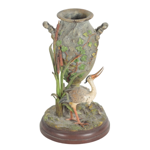 402 - A PAIR OF AUSTRIAN COLD-PAINTED BRONZE VASES both cast on a naturalistic bases with birds to the for... 