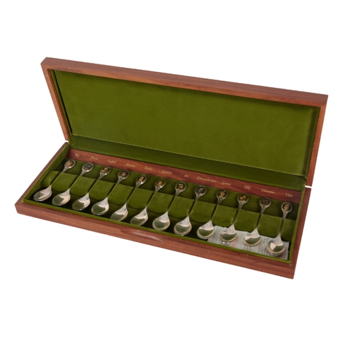 42 - JOHN PINCHES - TWO CASED SETS OF TWELVE COMMEMORATIVE SILVER SPOONS comprising The Royal Horticultur... 