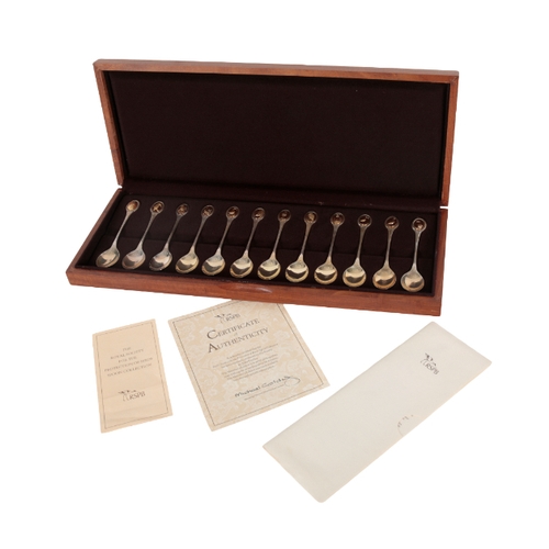 42 - JOHN PINCHES - TWO CASED SETS OF TWELVE COMMEMORATIVE SILVER SPOONS comprising The Royal Horticultur... 