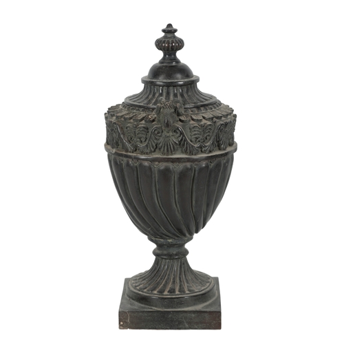 429 - A PAIR OF NEOCLASSICAL URNS of campagna form, each with turned lids, the bodies with anthemion carve... 