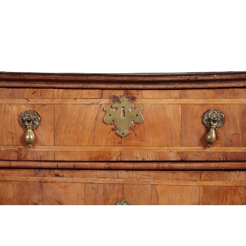 462 - A GEORGE II YEW VENEERED CHEST OF DRAWERS the top with central oval quartered and matched veneer pan... 