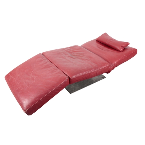 469 - A NATUZZI ITALIAN LEATHER DAY BED RETAILED BY HARRODS 20th century, with an adjustable back rest, on... 