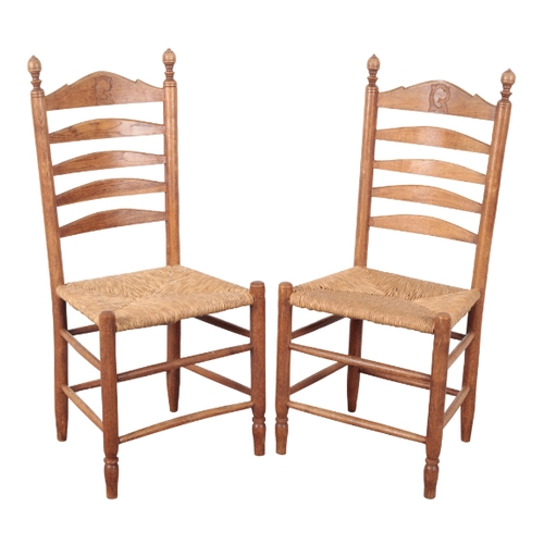 471 - A SET OF FOUR CONTINENTAL LADDER BACK CHAIRS 20th century, with rush seats, on turned legs joined by... 