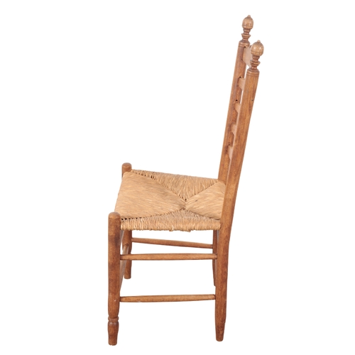 471 - A SET OF FOUR CONTINENTAL LADDER BACK CHAIRS 20th century, with rush seats, on turned legs joined by... 