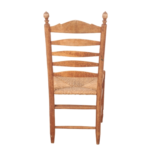 471 - A SET OF FOUR CONTINENTAL LADDER BACK CHAIRS 20th century, with rush seats, on turned legs joined by... 