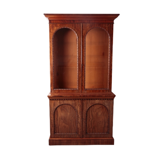 474 - A PAIR OF WILLIAM IV MAHOGANY BOOKCASE CABINETS circa 1830, each with a moulded cornice above two ar... 