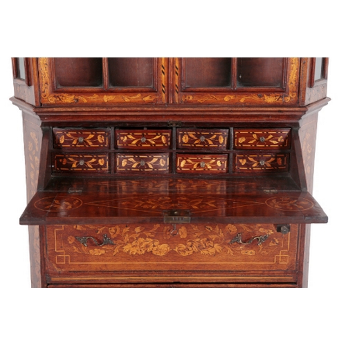 481 - A DUTCH INLAID OAK SECRETAIRE BOOKCASE 18th century and later, the upper part with carved scroll cre... 