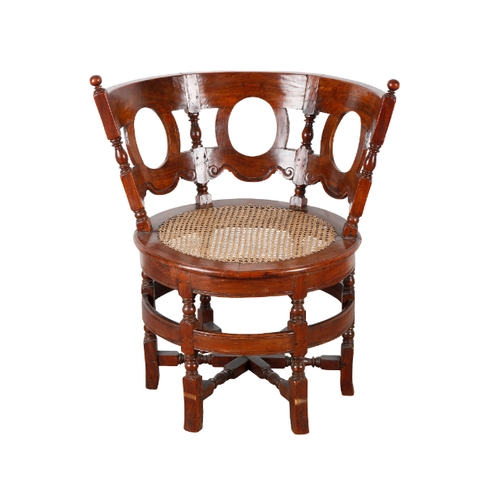 485 - A DUTCH EAST INDIES HARDWOOD BURGOMASTERS CHAIR 19th century, of typical form with curved pierced ba... 