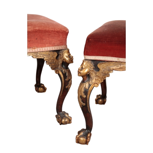 486 - A PAIR OF GEORGE II STYLE MAHOGANY AND PARCEL GILT STOOLS 19th century, the rectangular tops with re... 