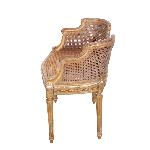 489 - A REGENCY GILTWOOD DRESSING CHAIR 19th century, with shaped and moulded cresting rail over a caned b... 