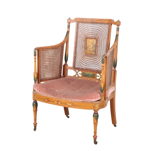 497 - AN EDWARDIAN PAINTED ARMCHAIR early 20th century, the caned back with a central panel depicting a re... 