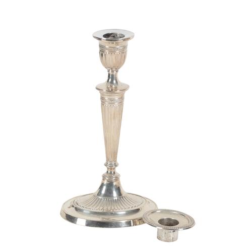 5 - A PAIR OF LATE VICTORIAN SILVER CANDLESTICKS IN NEO-CLASSICAL STYLE with fluted sconces and stems, m... 