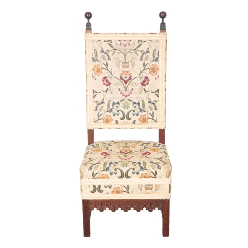 501 - A PAIR OF CHARLES II STYLE MAHOGANY HALL CHAIRS with foliate pattern covers, the square backs with t... 