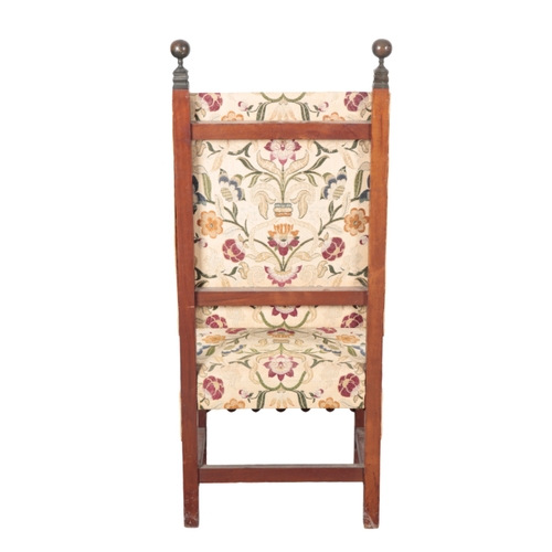 501 - A PAIR OF CHARLES II STYLE MAHOGANY HALL CHAIRS with foliate pattern covers, the square backs with t... 