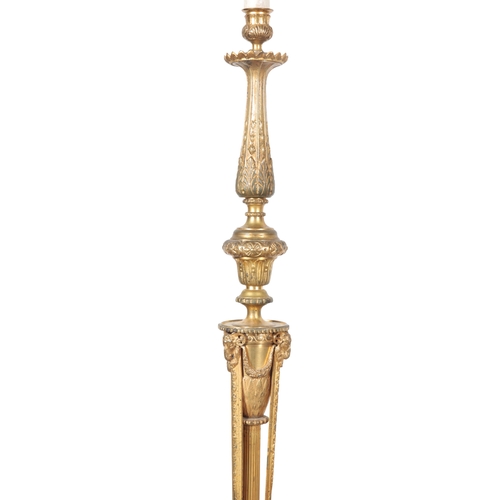 506 - AN EMPIRE STYLE GILT METAL STANDARD LAMP 20th century, with baluster turned column to a pedestal bas... 