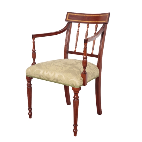 515 - A GEORGE III STYLE MAHOGANY ARMCHAIR with damask covers, on turned front legs, 88cm high x 55cm wide