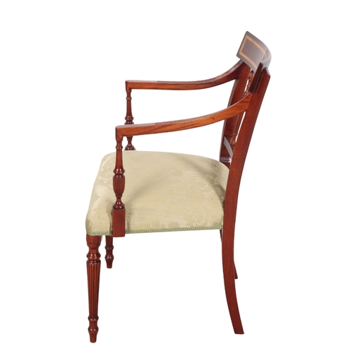 515 - A GEORGE III STYLE MAHOGANY ARMCHAIR with damask covers, on turned front legs, 88cm high x 55cm wide