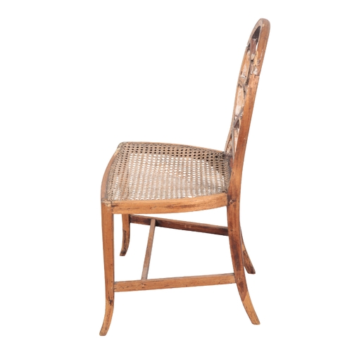 518 - A STRIPPED BEECHWOOD OCCASIONAL CHAIR OF SHERATON STYLE 19th Century, with oval fan back, dished can... 