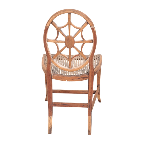 518 - A STRIPPED BEECHWOOD OCCASIONAL CHAIR OF SHERATON STYLE 19th Century, with oval fan back, dished can... 