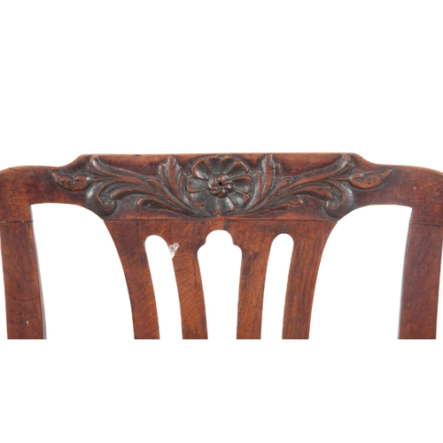 526 - A GEORGE II WALNUT SIDE CHAIR 18th century, the carved cresting rail over a pierced back, with drop ... 