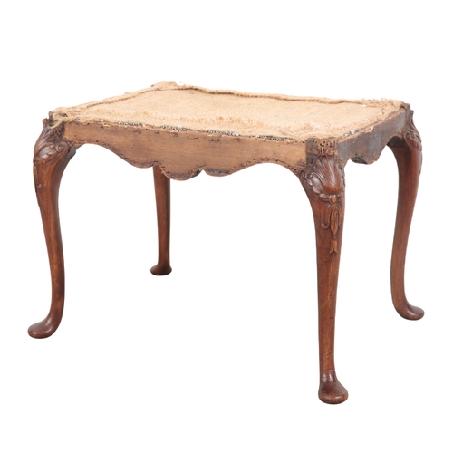 528 - A GEORGE II STYLE WALNUT STOOL the slender cabriole legs with shell, bellflower and swag relief carv... 