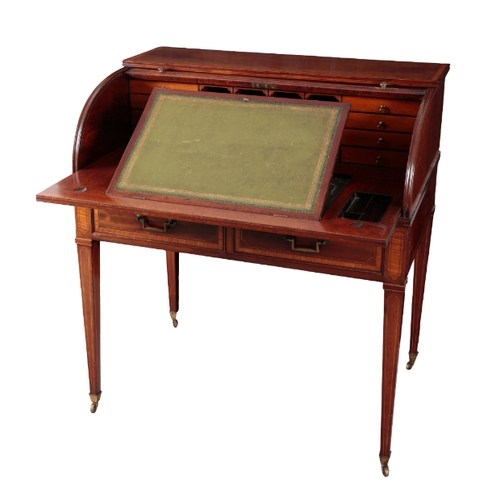 546 - AN EDWARDIAN MAHOGANY INLAID BUREAU A CYLINDRE the roll top opening to reveal a fitted interior and ... 