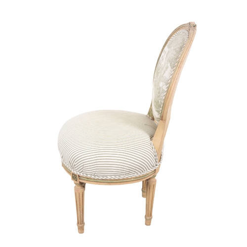 557 - A BELGIAN GREY AND GREEN PAINTED OCCASIONAL CHAIR BY MAISON DE WIT early 20th Century, the oval back... 