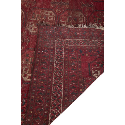 571 - A BESHIRI OR BELUCHI CARPET late 19th / early 20th Century woven in muted colours, yellow and ivory ... 