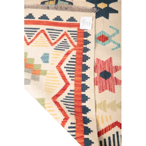 578 - A CONTEMPORARY ANATOLIAN STYLE KILIM CARPET woven in colours with scattered geometric motifs on a fa... 