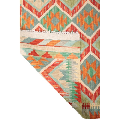 587 - A CONTEMPORARY ANATOLIAN STYLE KILIM RUG woven in pale colours with endless pole medallion repeat, o... 