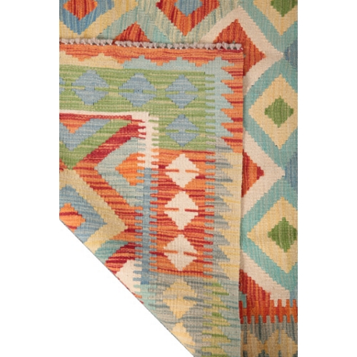 588 - A CONTEMPORARY ANATOLIAN STYLE KILIM RUG woven in 'vegetable' colours with endless lozenge repeat on... 