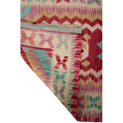 588 - A CONTEMPORARY ANATOLIAN STYLE KILIM RUG woven in 'vegetable' colours with endless lozenge repeat on... 