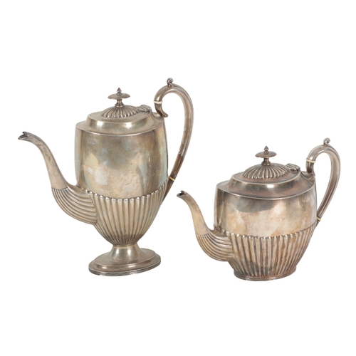 59 - A FOUR PIECE SILVER TEA SERVICE BY JOSIAH WILLIAMS & CO London 1890, including a coffee pot, 27cm hi... 