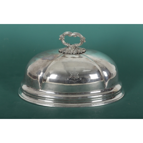 70 - A SET OF THREE 19TH CENTURY SILVER PLATED GRADUATED OVAL CLOCHES with leaf mounts and lobed bodies, ... 