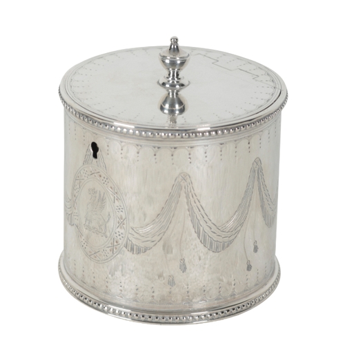 8 - A GEORGE III SILVER CYLINDRICAL TEA CADDY probably by John Deacon, London 1776, engraved with swags ... 