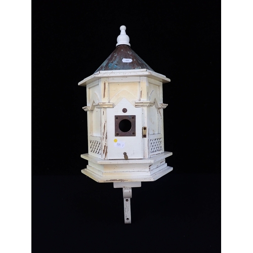 30 - A BIRD NESTING BOX, PAINTED WOOD with copper roof, in the form of a pavilion, with attached bracket ... 